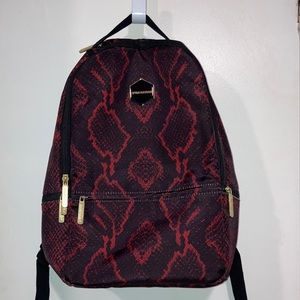 sprayground red snake skin backpack